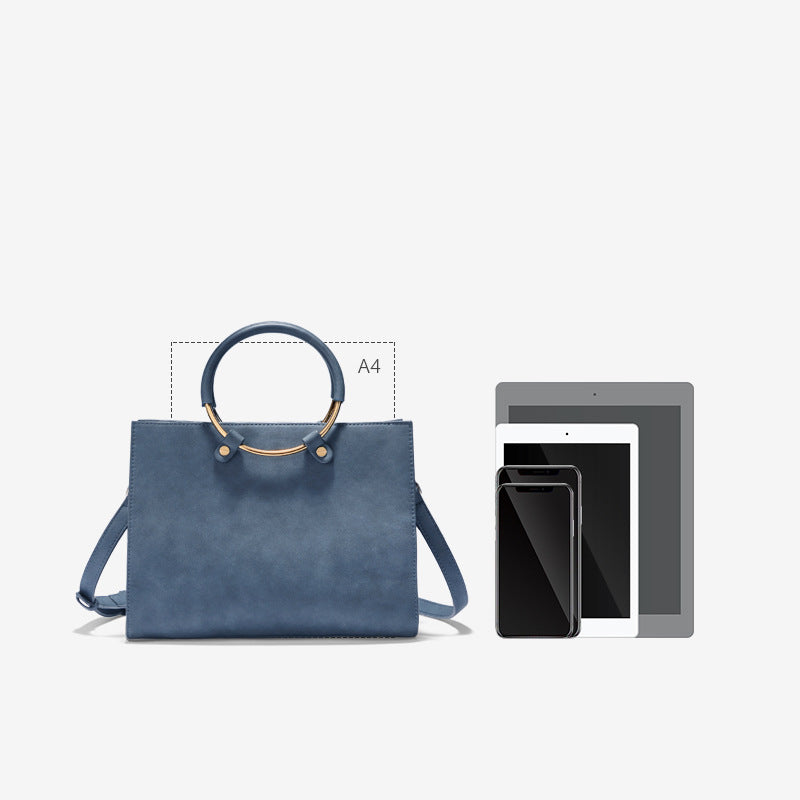 Timeless Elegance: Blue Leather Medium-sized Purse with Metal ring handles