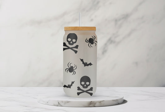 Enjoy your favorite beverage in our Dancing Skeletons Frosted 16 oz Libbey Style Glass with bamboo lid and straw